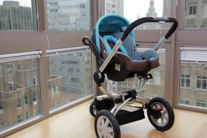 Fancy baby car seat mounted on a stroller